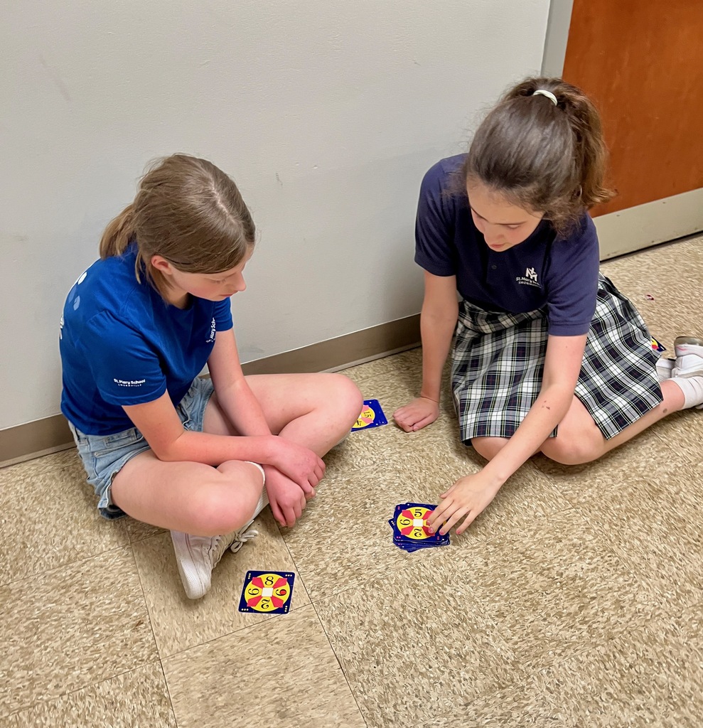 Grade 6 students play a mental math card game