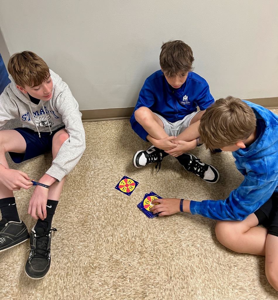 Grade 6 students play a mental math card game