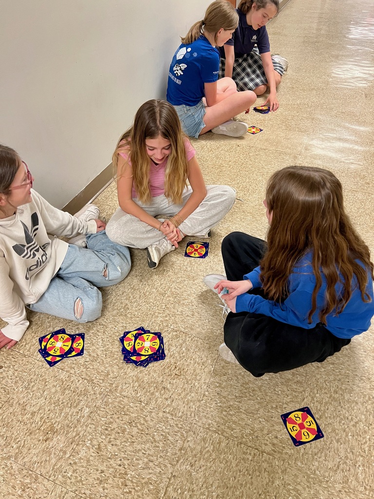 Grade 6 students play a mental math card game