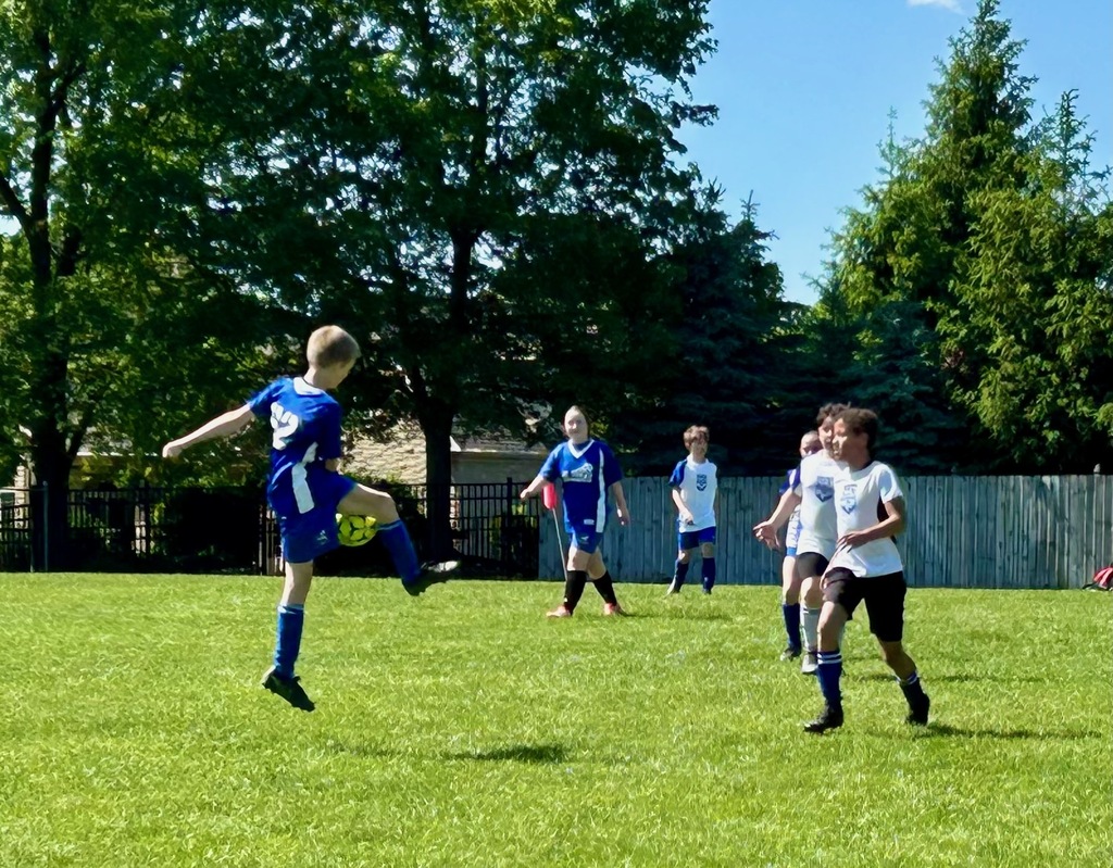 St. Mary School 5th & 6th graders on Coach Costello's JV Soccer team face off against players from Christian Central Academy