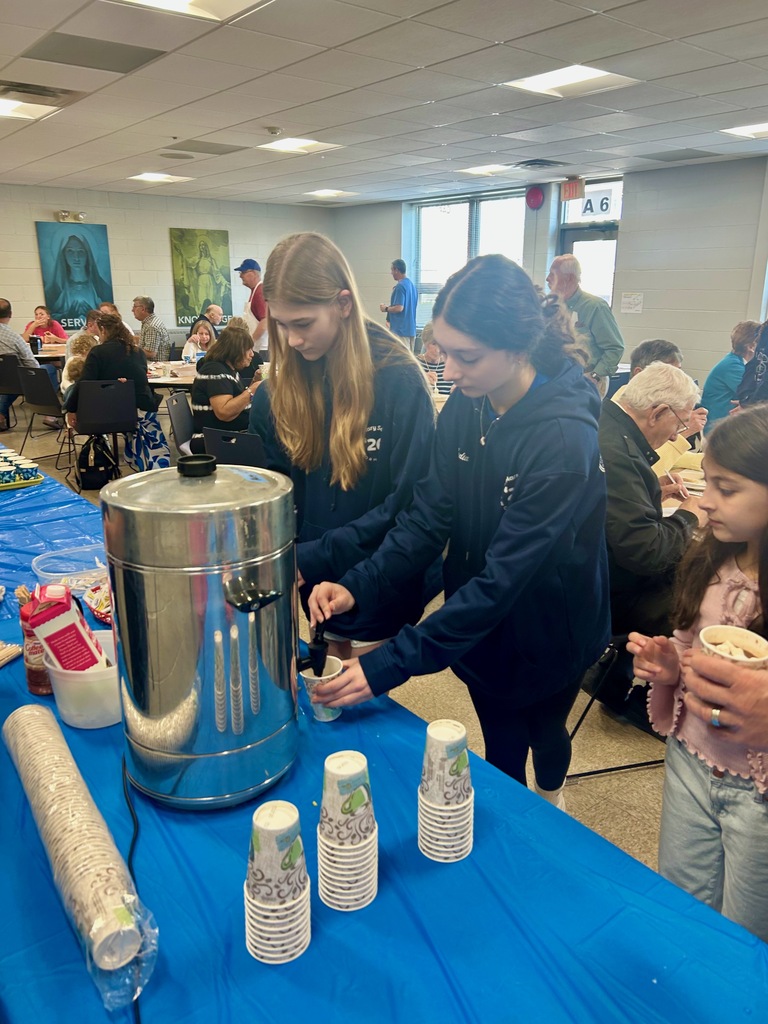 SMS students volunteering at a pancake breakfast