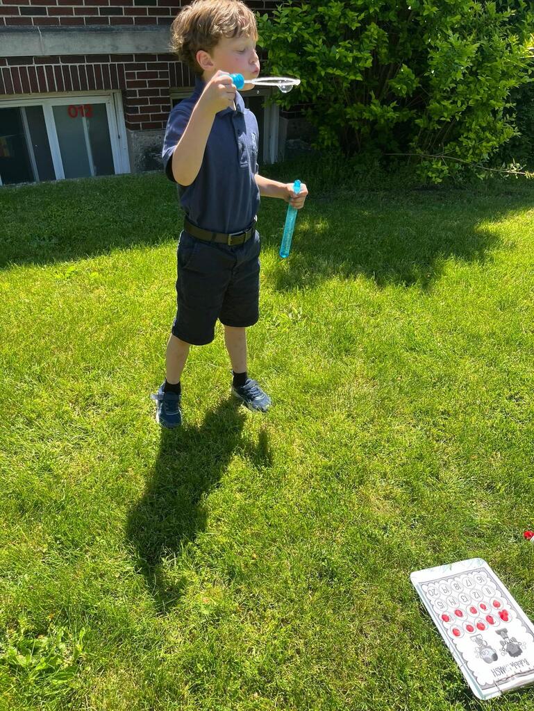 grade 1 students have fun outside with bubble themed lessons