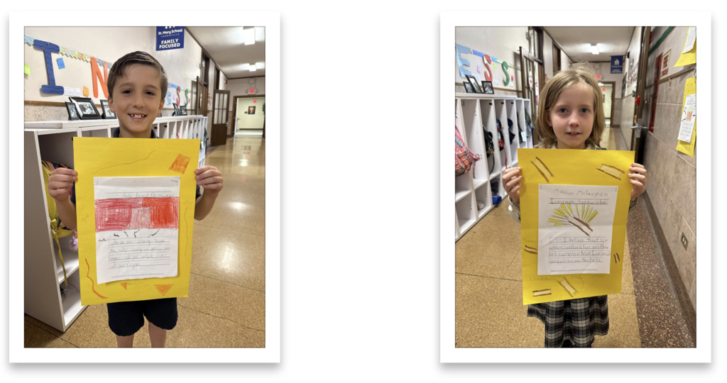 grade 2 students hold up their persuasive writing essays