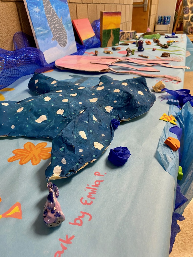 Students' clay sculptures of sea creatures