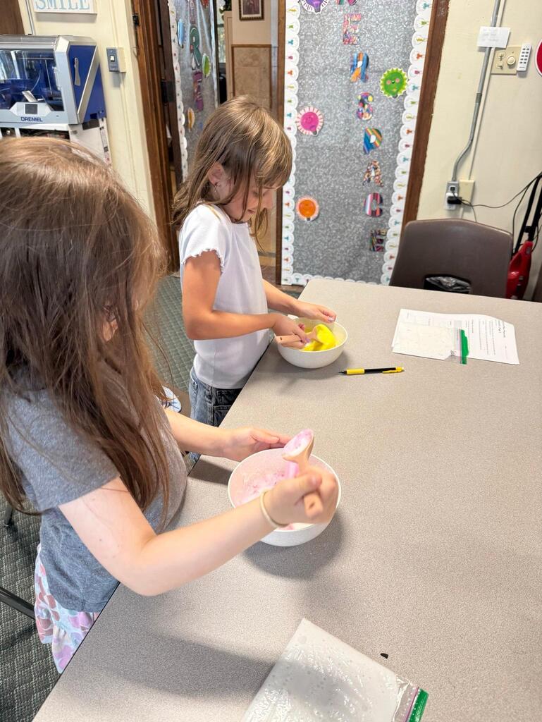 students make slime at chemistry themed summer day camp