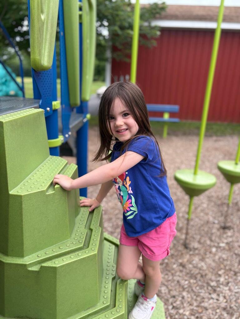 child having fun playin on a playground