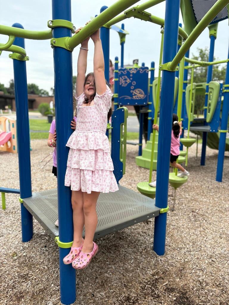 child having fun playin on a playground