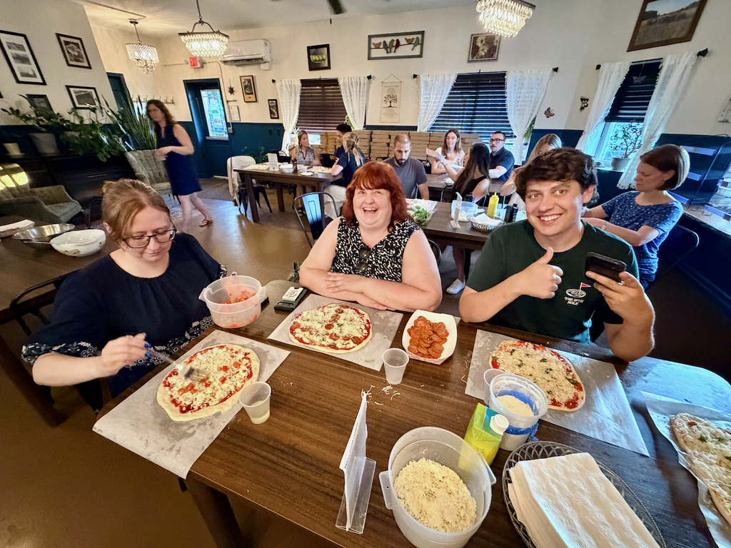 teachers make pizza at Terra House