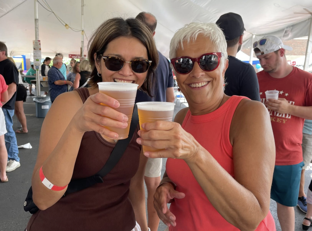 women enjoying a glass of beer