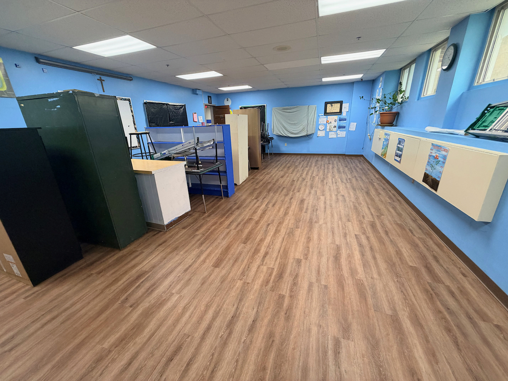 New lower level flooring in school with an updated, wood look