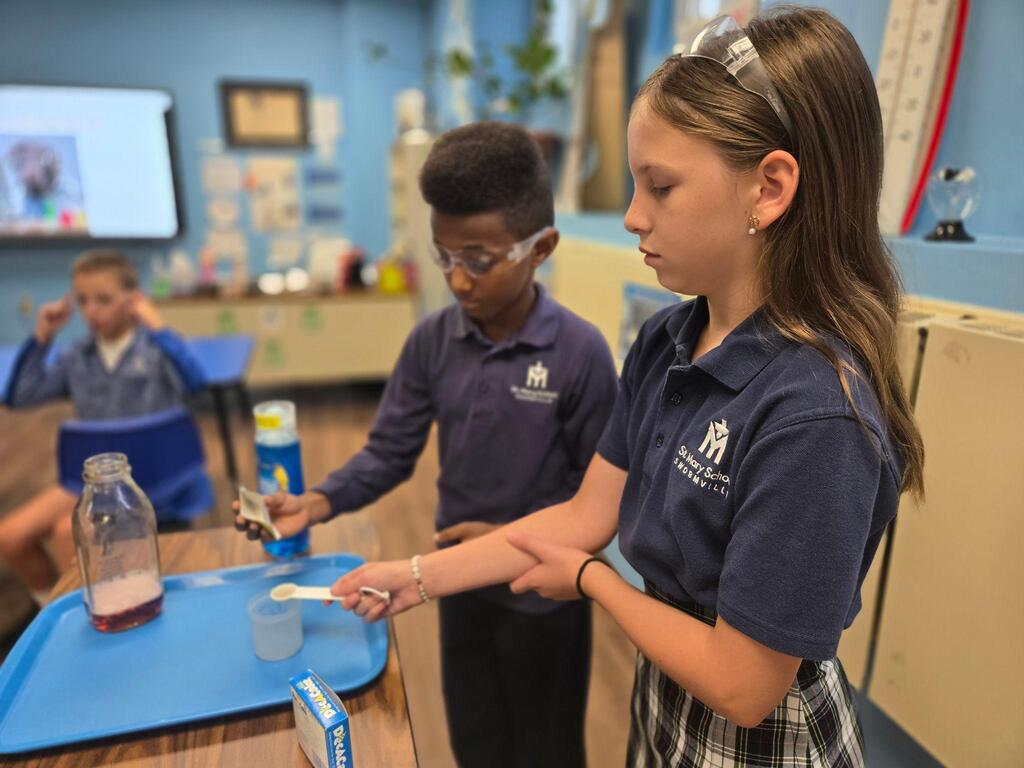 students making elephanty toothpaste