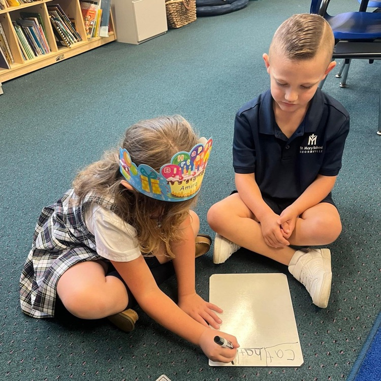 students sitting together and working