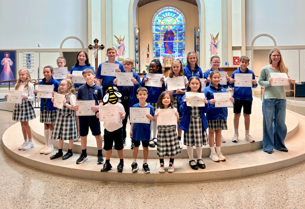 group picture of students and teacher who won virtue awards