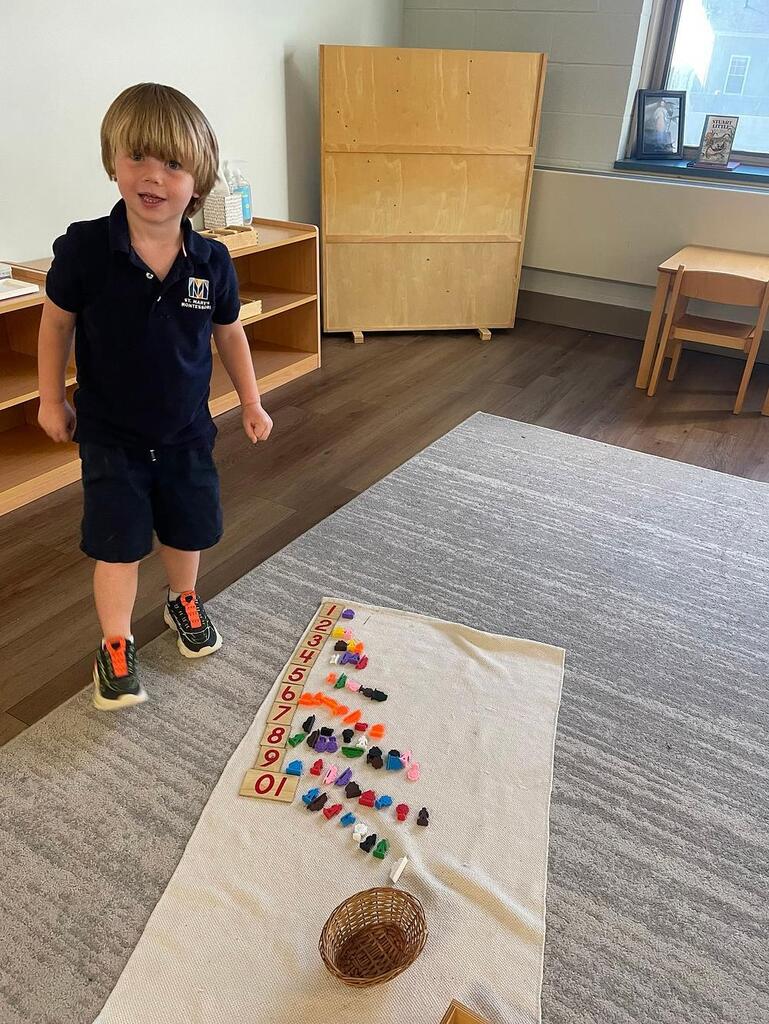 Montessori students at work in their classroom