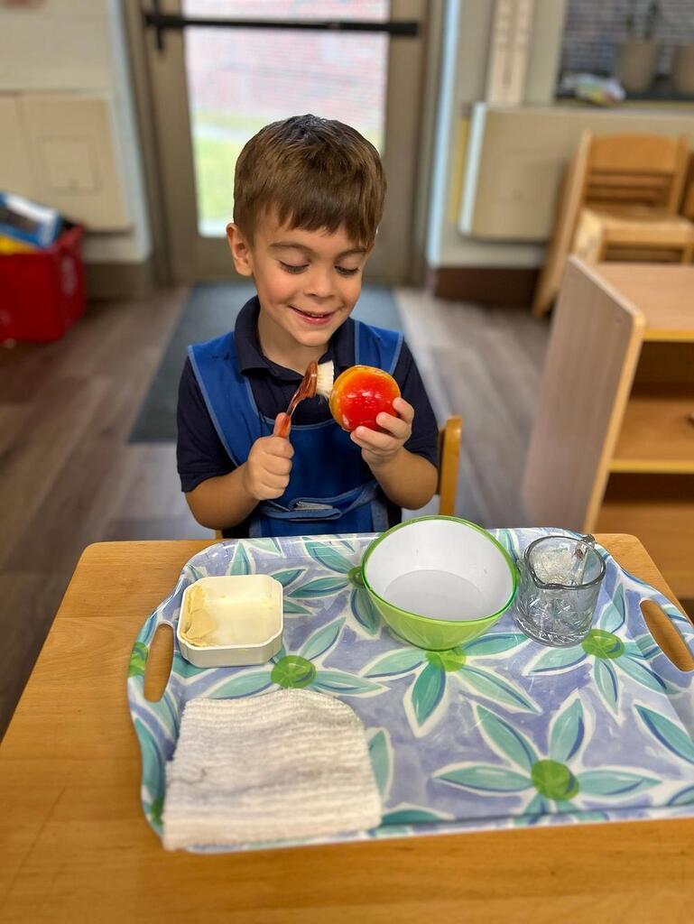 Montessori students at work in their classroom