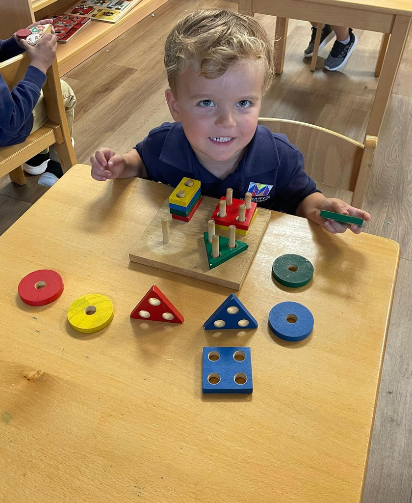Montessori students at work in their classroom