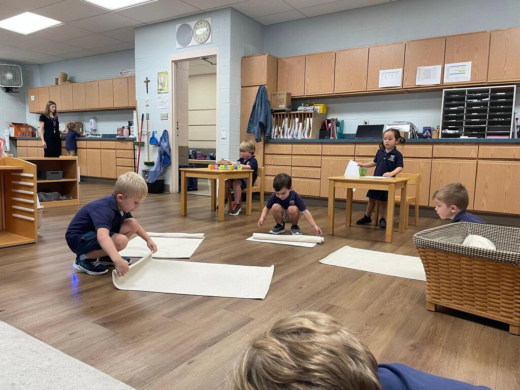 Montessori students at work in their classroom