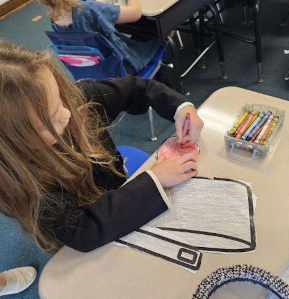 Kindergarten class learns about apples and johnny appleseed