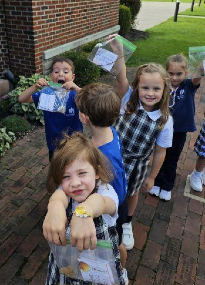 kindergarten students smiling in a group