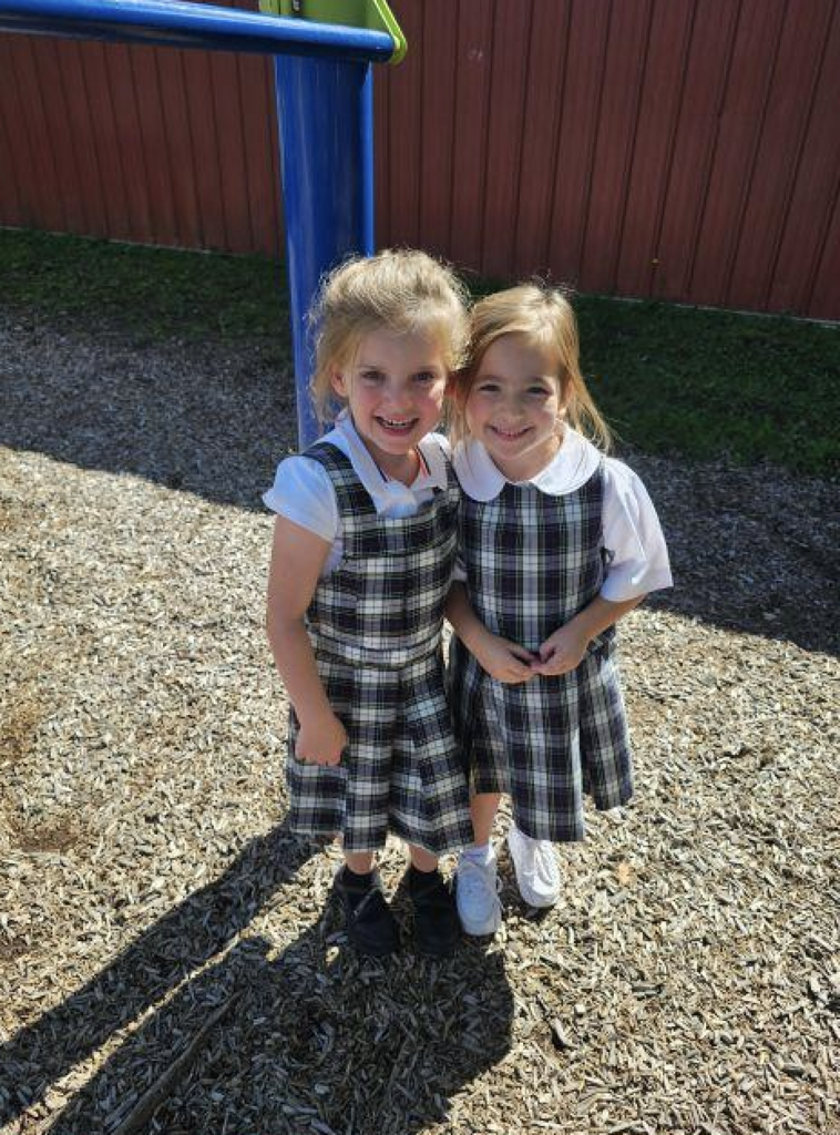 kindergarten students smiling in a group