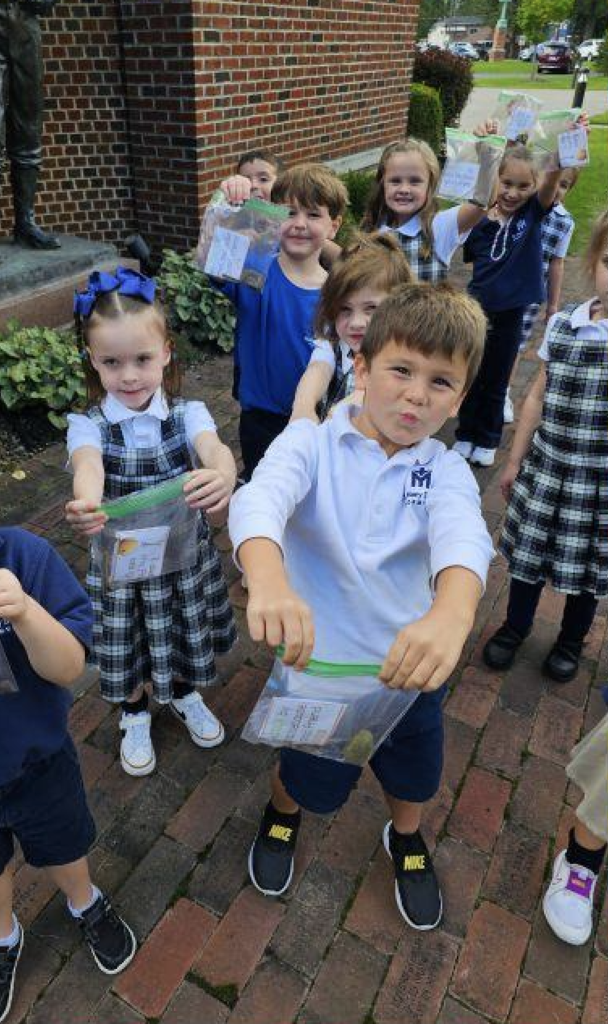 kindergarten students smiling in a group