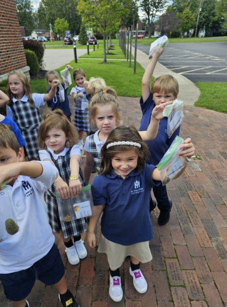 kindergarten students smiling in a group
