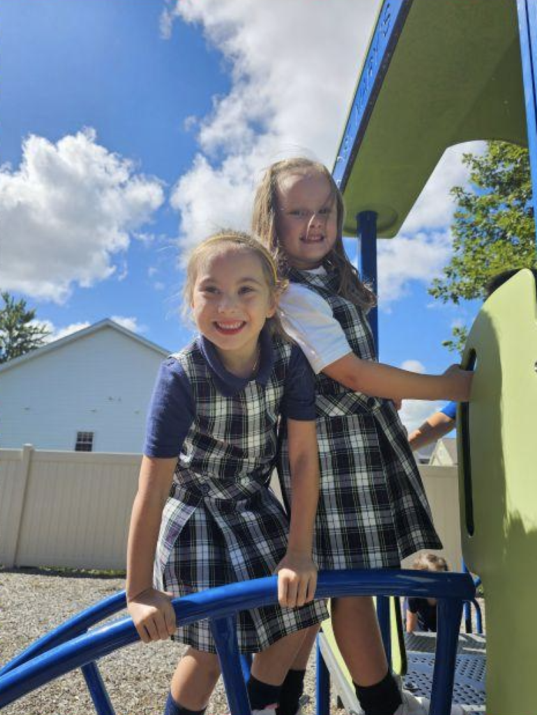 kindergarten students smiling in a group