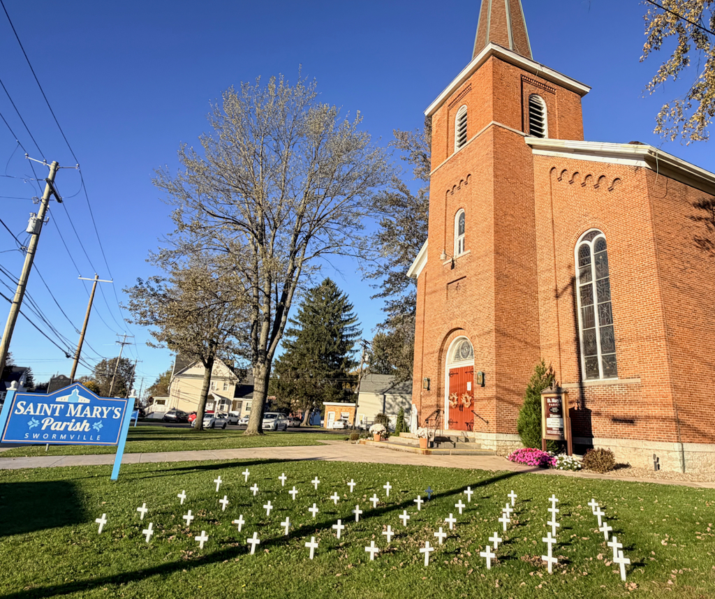 white crosses on church lawns