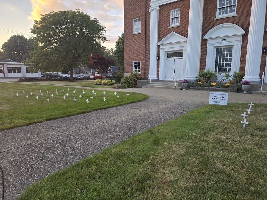 white crosses on church lawns