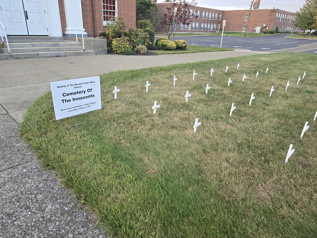 white crosses on church lawns