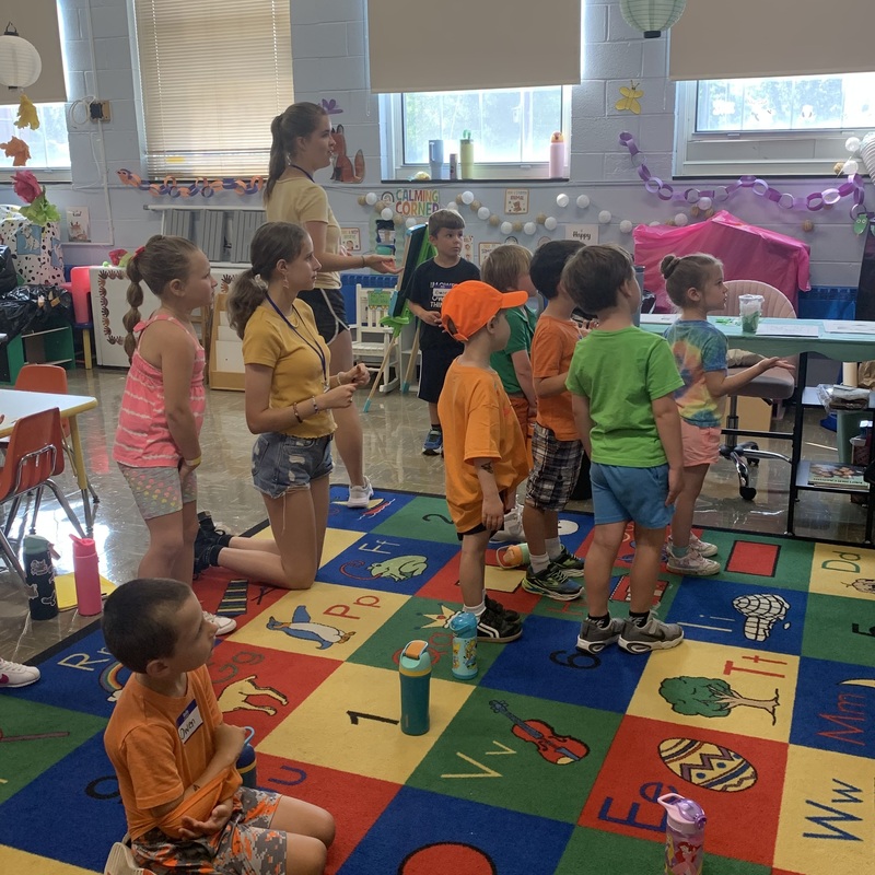 Kindergarten sloths practicing their songs