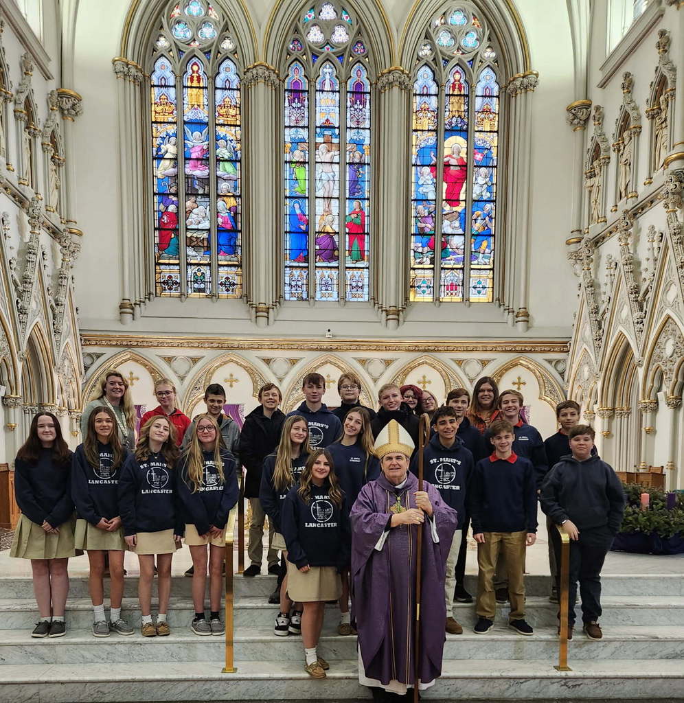 Our future graduates with Bishop Fisher after the 8th grade at St. Joseph Cathedral earlier this week. 