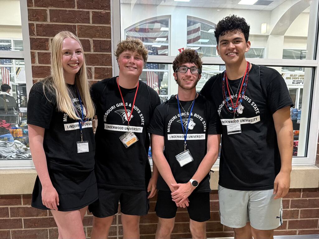 4 SMA students stand together at the Missouri Boys and Girls leadership program.