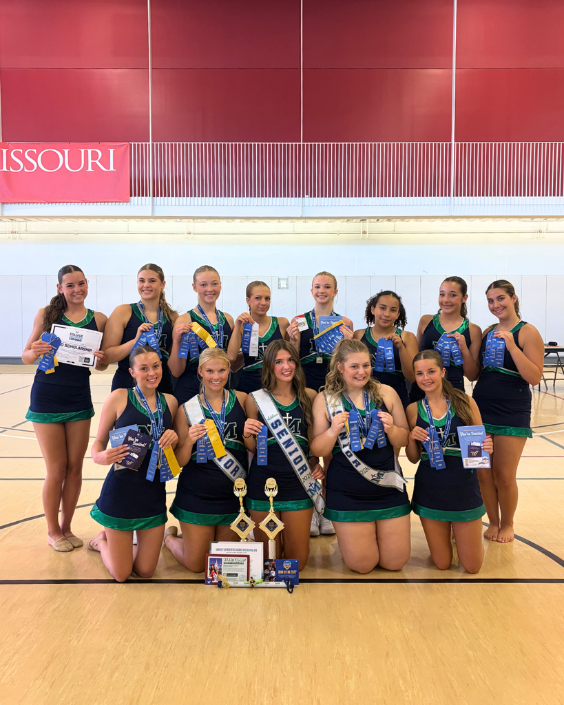 SMA girls dance team pose with their ribbons.