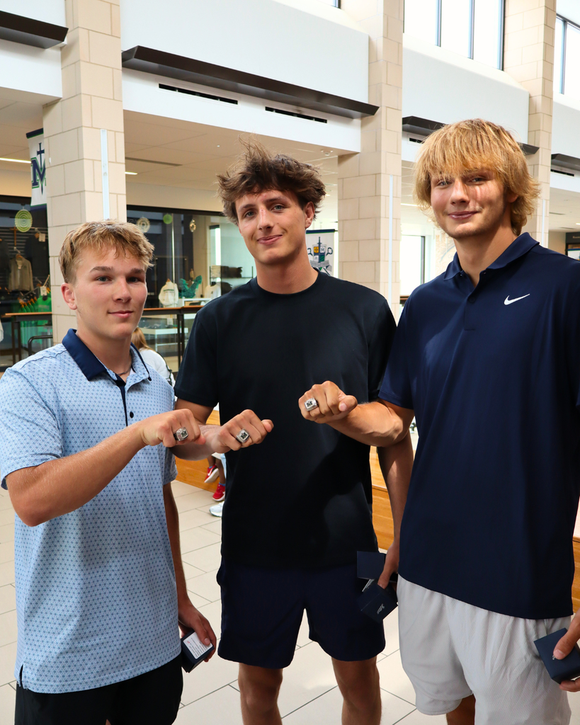 3 wrestlers pose with their State rings