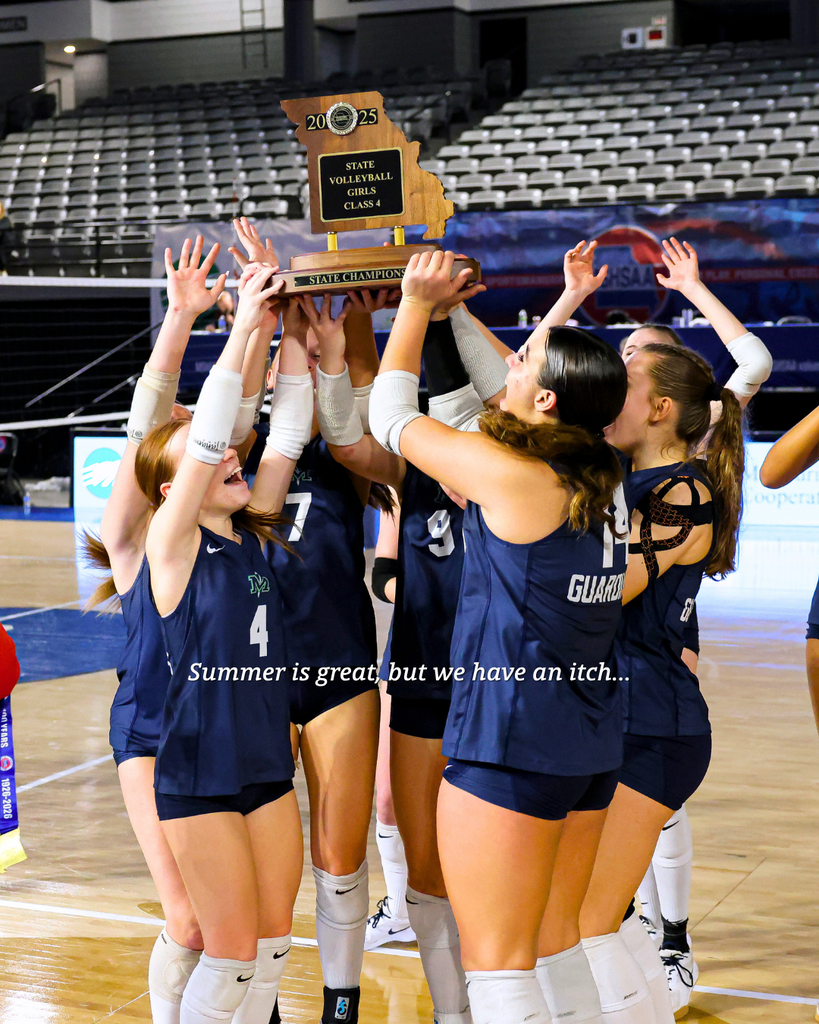 The volleyball team cheers with their trophy.
