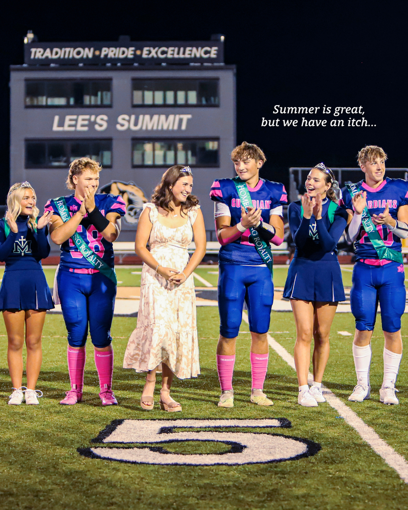 Homecoming royalty claps for the winner.