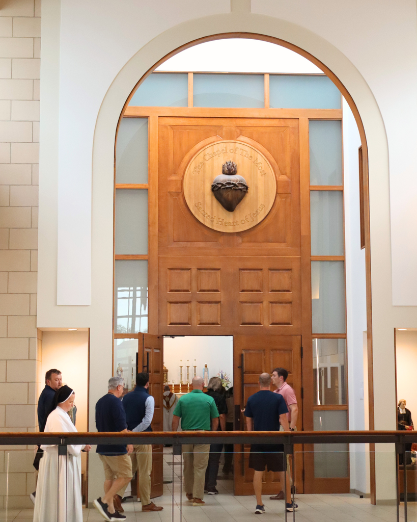 Staff walks into the chapel.