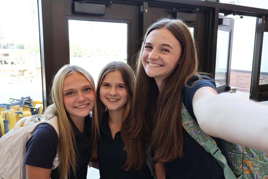 Students selfie for the camera.