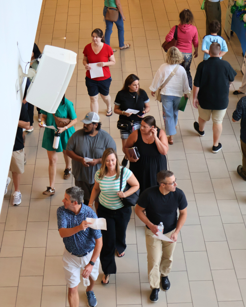 Parents walk through the halls.
