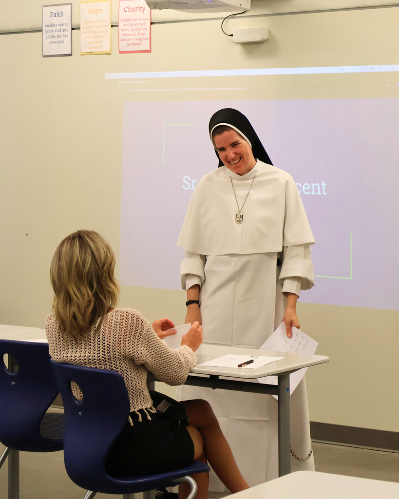 Sr. Michael Vincent laughs with a parent.