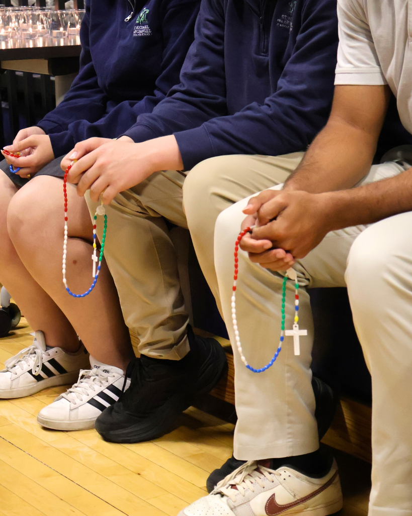Students praying the rosary