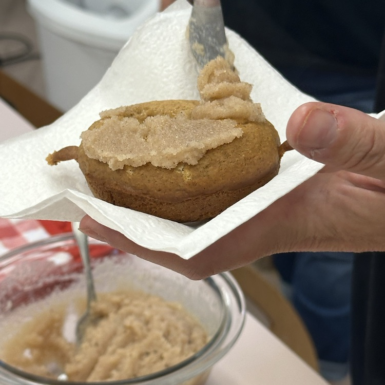 putting the yummy topping on