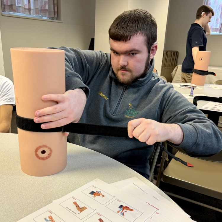 students taking a stop the bleed training