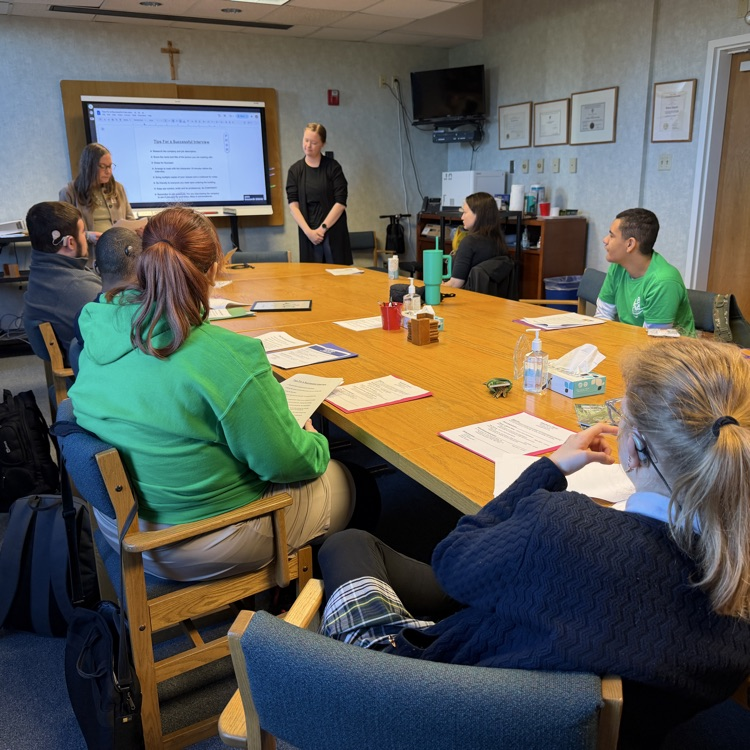 students watching a presentation 