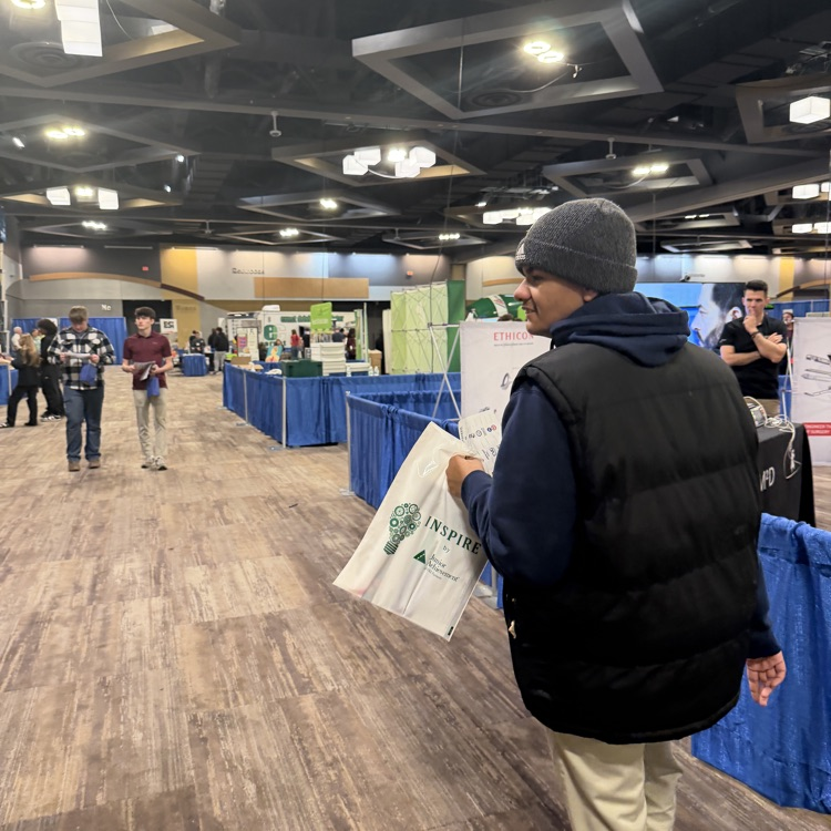 student walking through job fair
