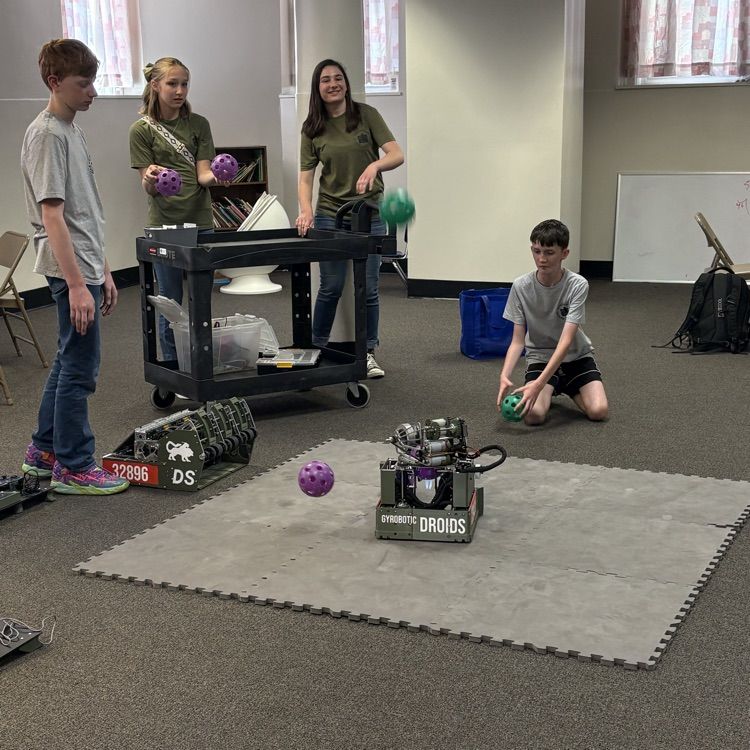 demonstrating how their robots work