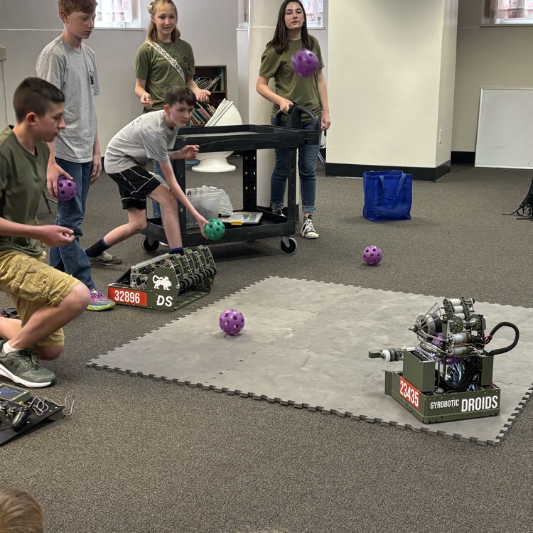 demonstrating how their robots work