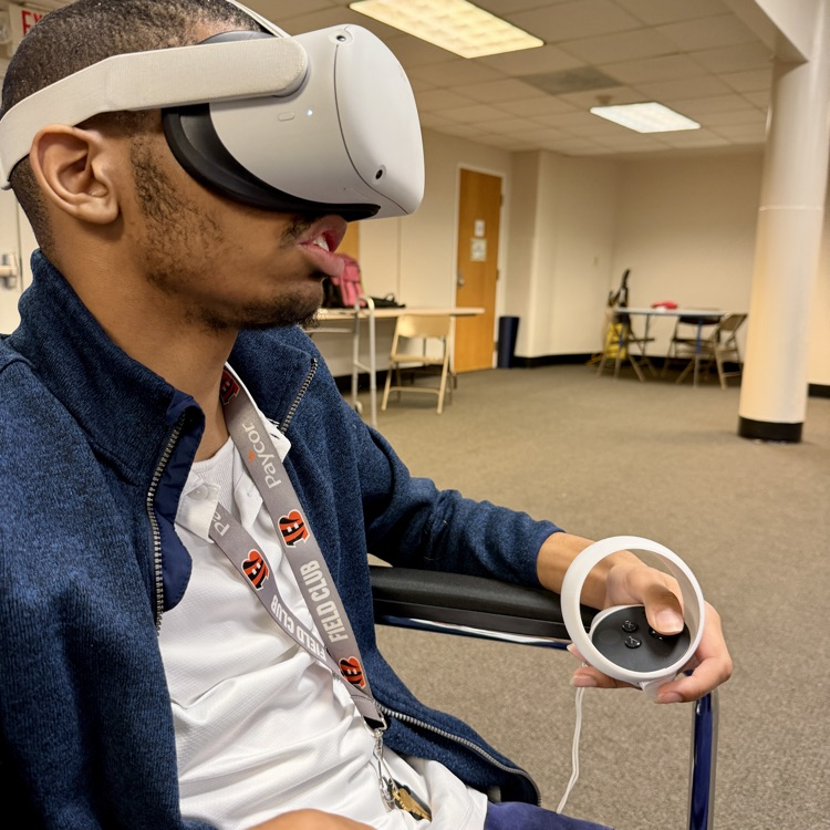 a student is using a VR headset to explore career simulations