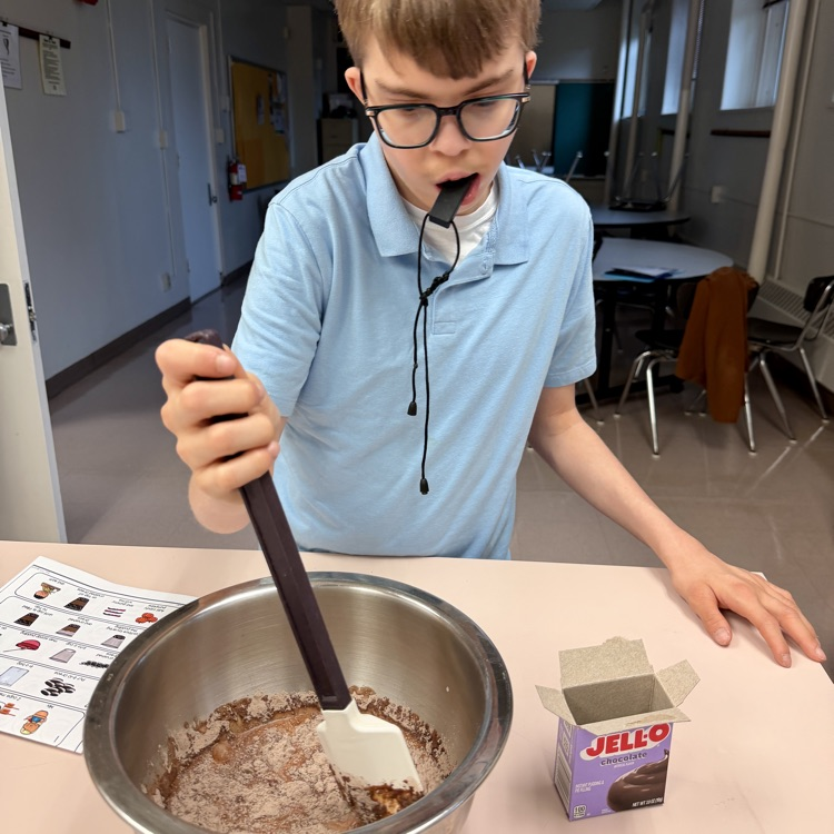 a student is making pudding in home ec. he is storing the mixture.
